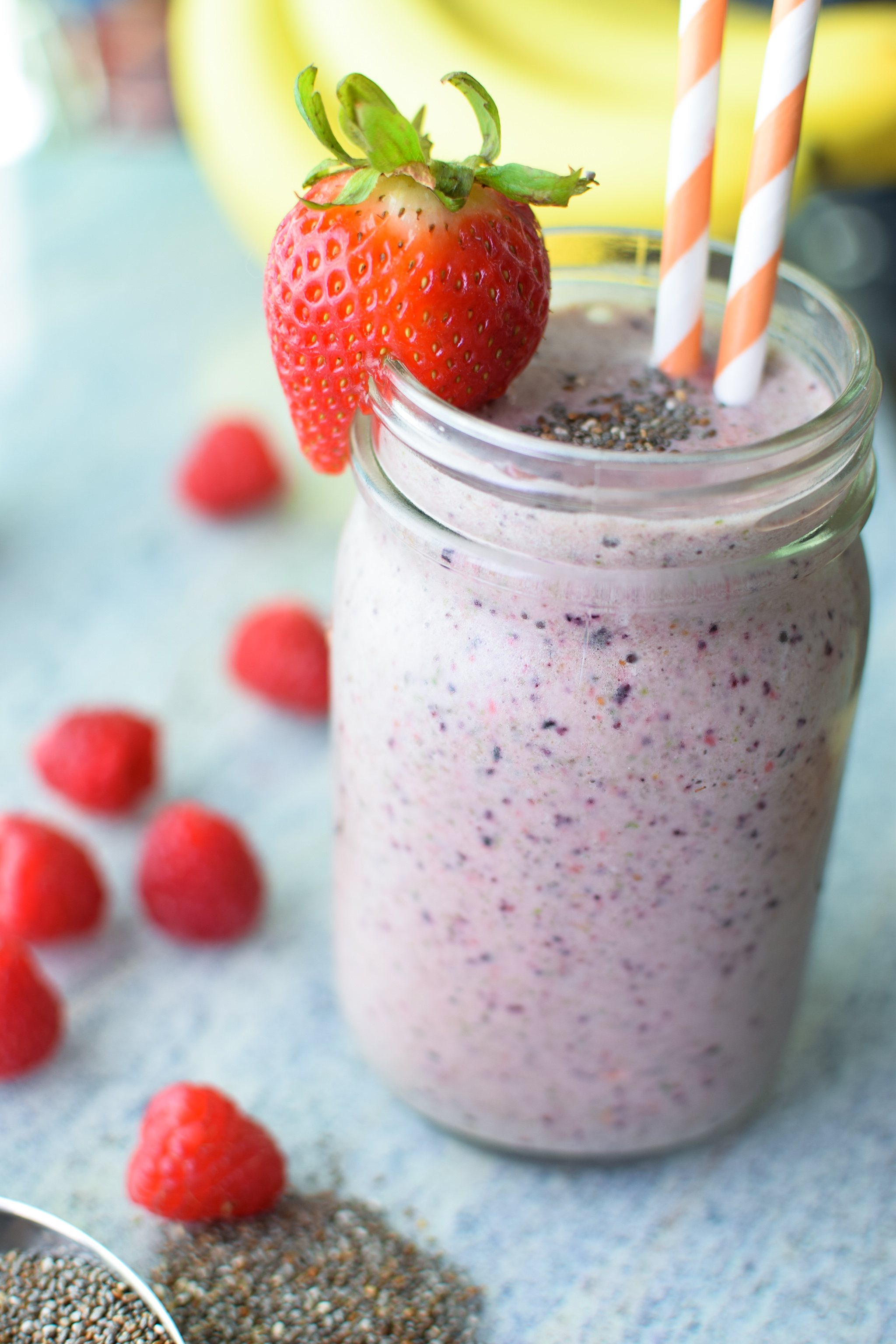 Our very favorite go-to Berry Protein Smoothies recipe in two ways! Packed with berries, greens, and protein, and super easy for meal prepping! - pmp.local