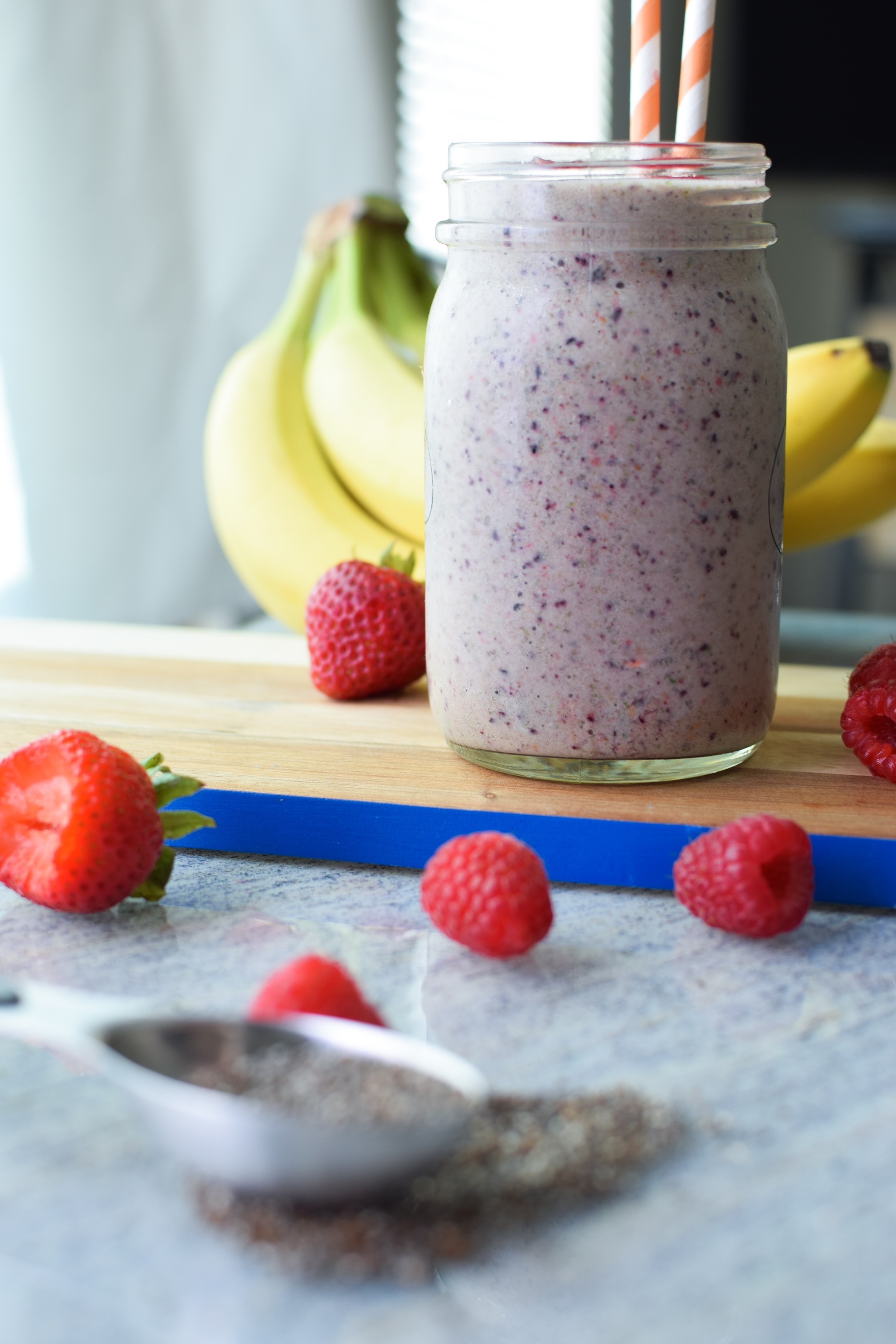 Our very favorite go-to Berry Protein Smoothies recipe in two ways! Packed with berries, greens, and protein, and super easy for meal prepping! - pmp.local