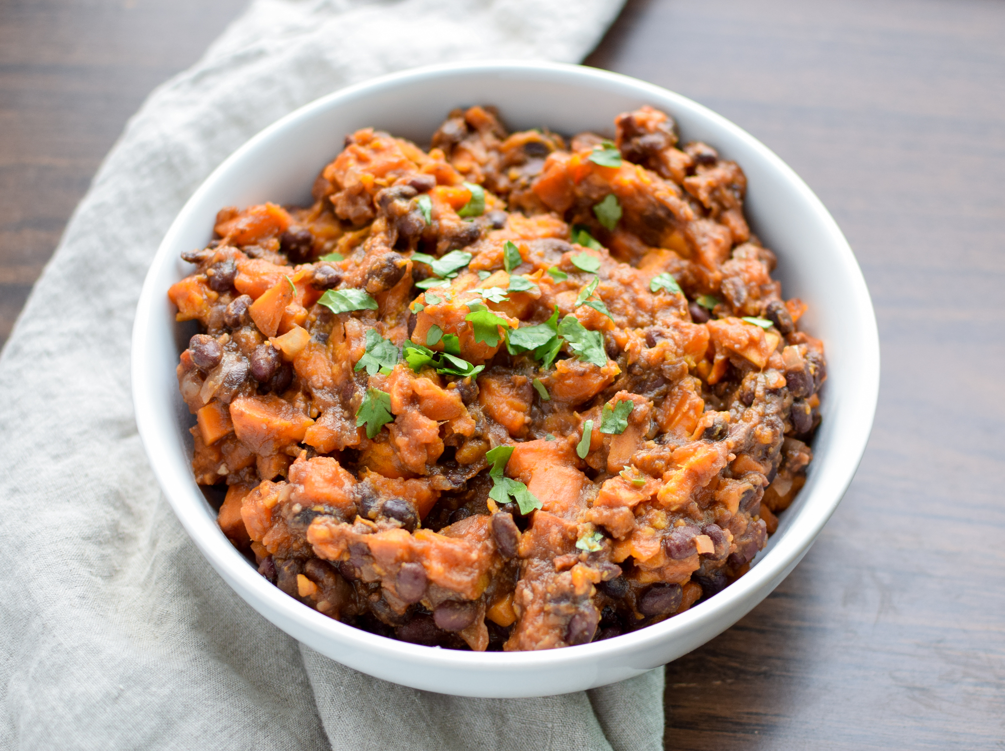 BBQ Black Bean Slow Cooker Sweet Potatoes - Black beans, sweet potatoes, and spicy BBQ sauce. A match made in side dish heaven! - pmp.local