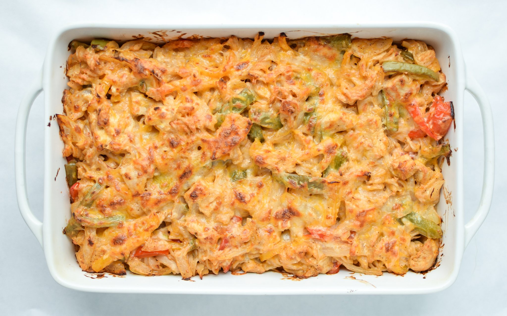 Baked Chicken Fajita Noodle Casserole - All the best chicken fajita flavors with peppers and onions, in casserole form! - pmp.local