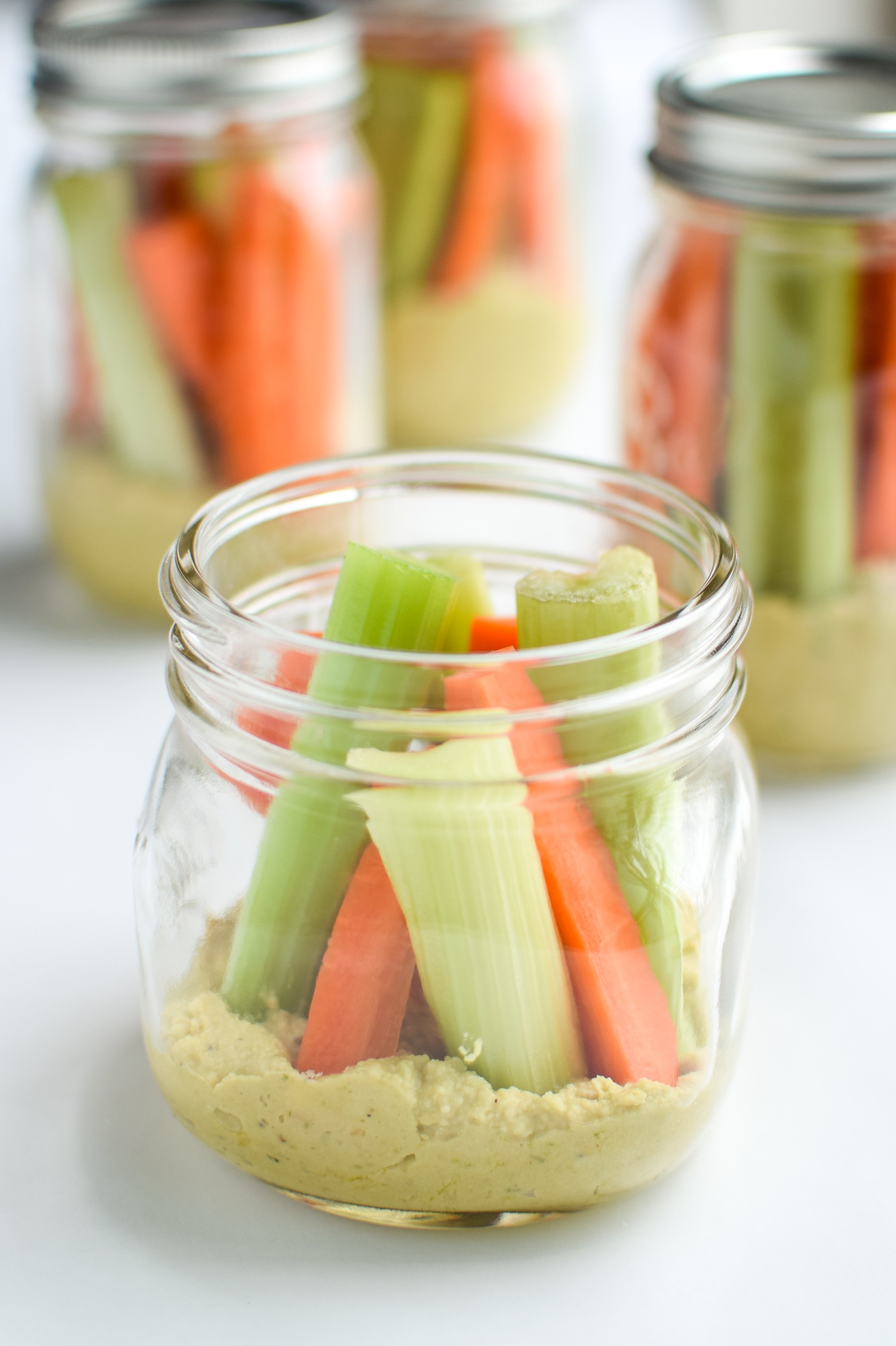 Snack Prep: Veggie Sticks with Easy Pesto Hummus recipe - A pesto twist on the classic hummus, plus, have you tried it with veggies in a mason jar? - pmp.local