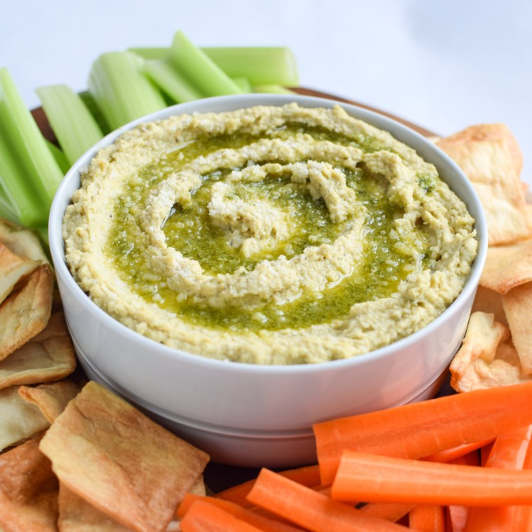 Snack Prep: Veggie Sticks with Easy Pesto Hummus recipe - A pesto twist on the classic hummus, plus, have you tried it with veggies in a mason jar? - ProjectMealPlan.com