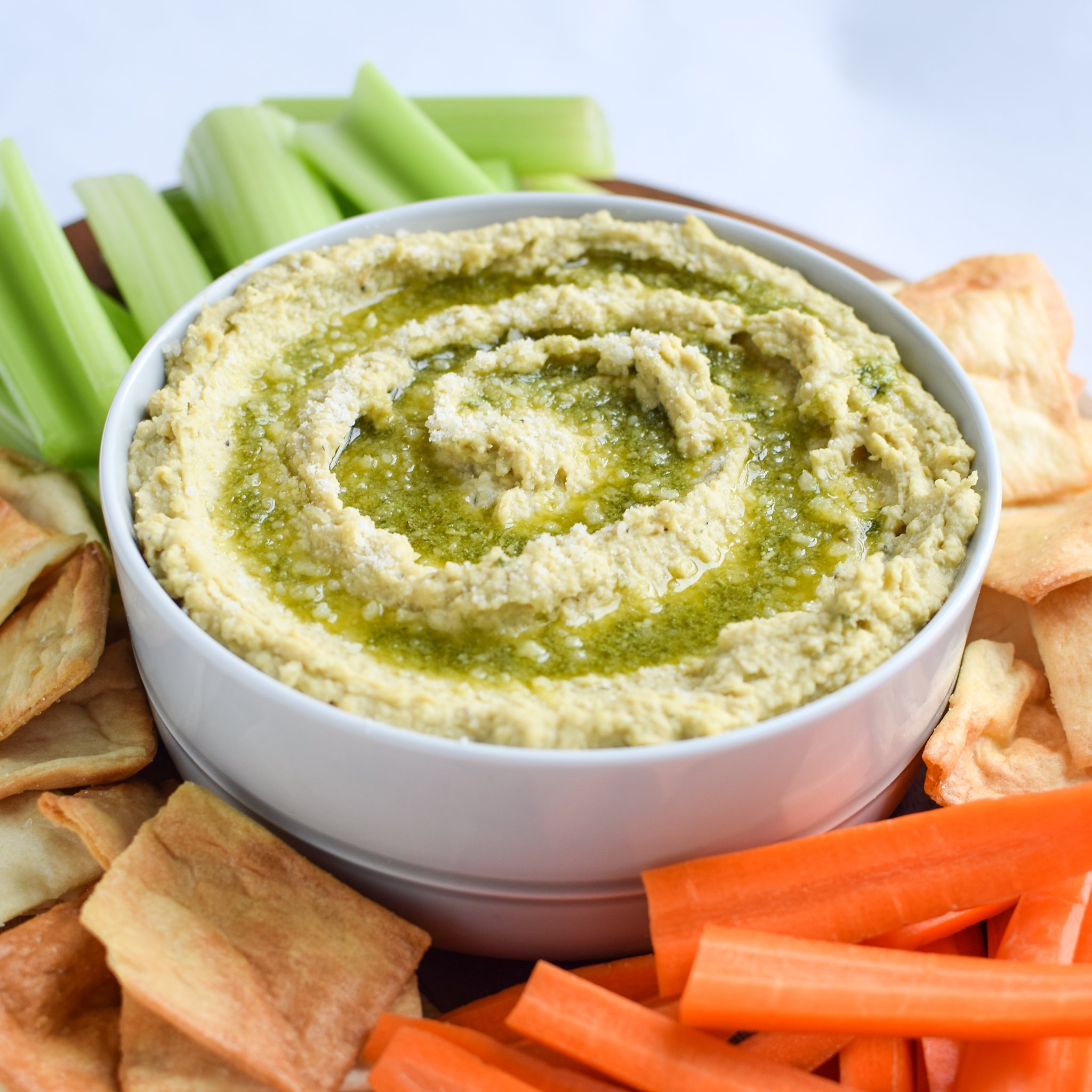 Snack Prep: Veggie Sticks with Easy Pesto Hummus recipe - A pesto twist on the classic hummus, plus, have you tried it with veggies in a mason jar? - pmp.local