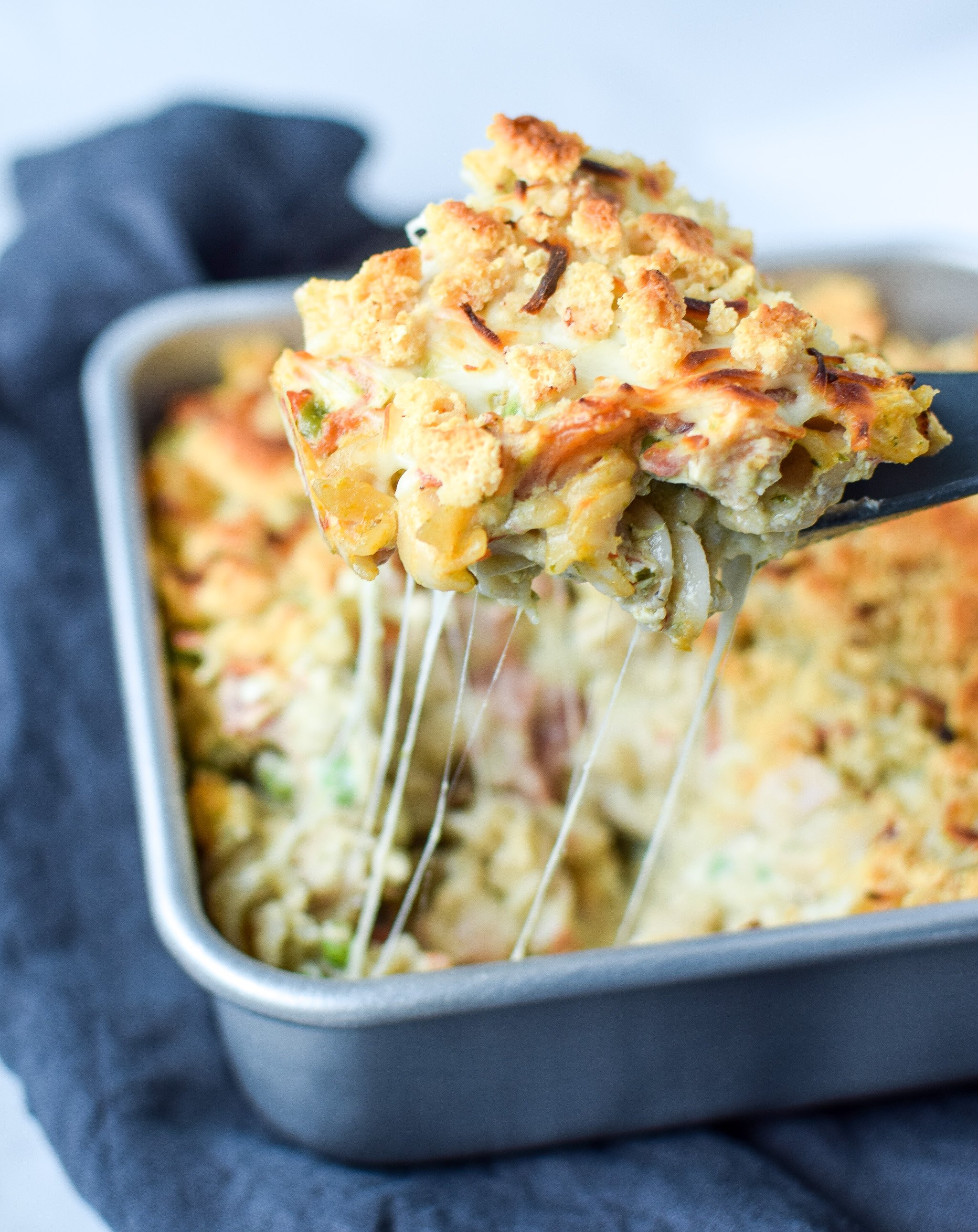 Creamy Pesto Pasta Chicken Bake with Peas - Pesto, chicken, noodles and more in this simple weeknight dinner! Perfect for leftover chicken! - pmp.local