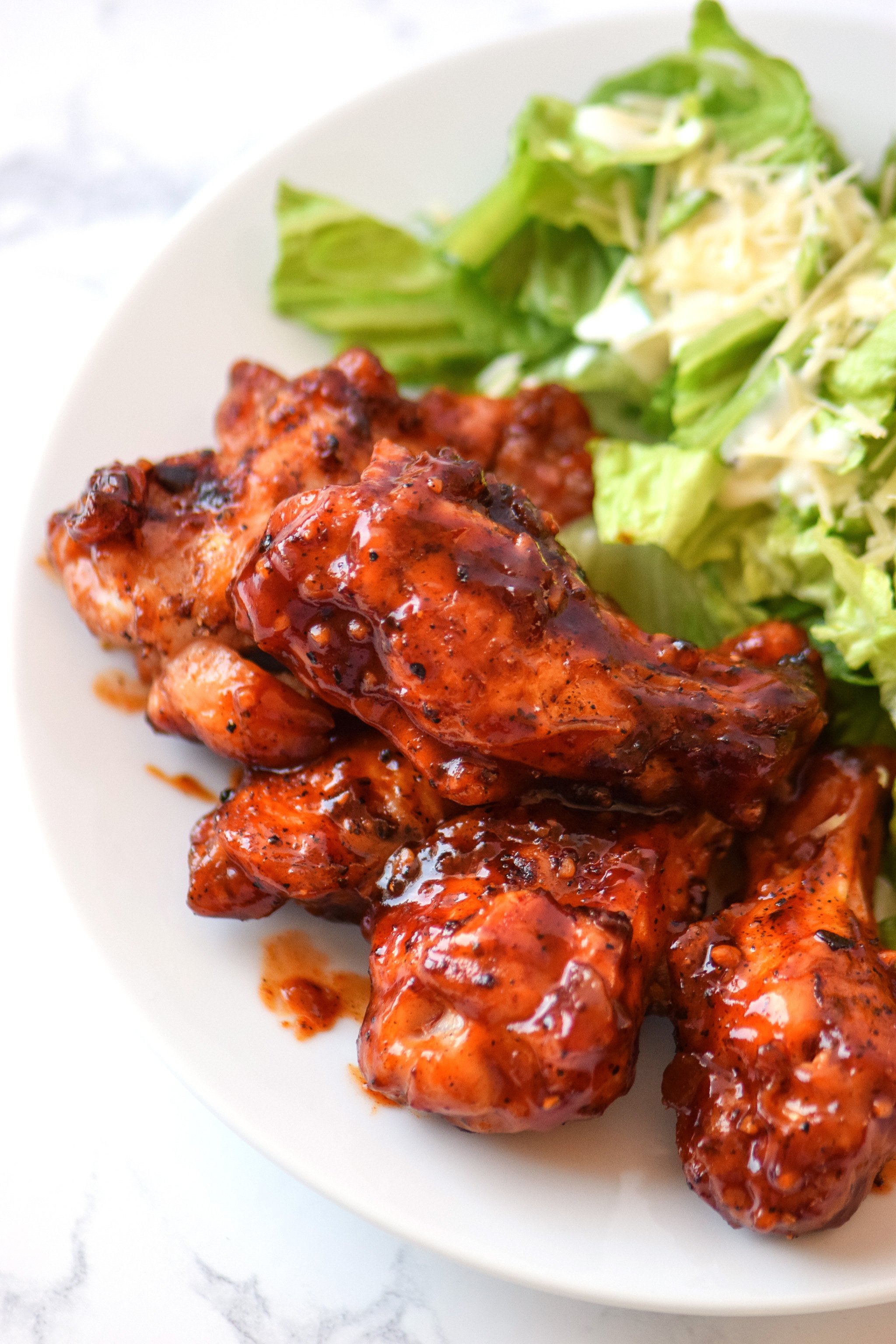 Smoky Habanero Barbecue Grilled Chicken Wings recipe - Crispy barbecue grilled wings smothered in smoky hot tangy habanero BBQ sauce! pmp.local