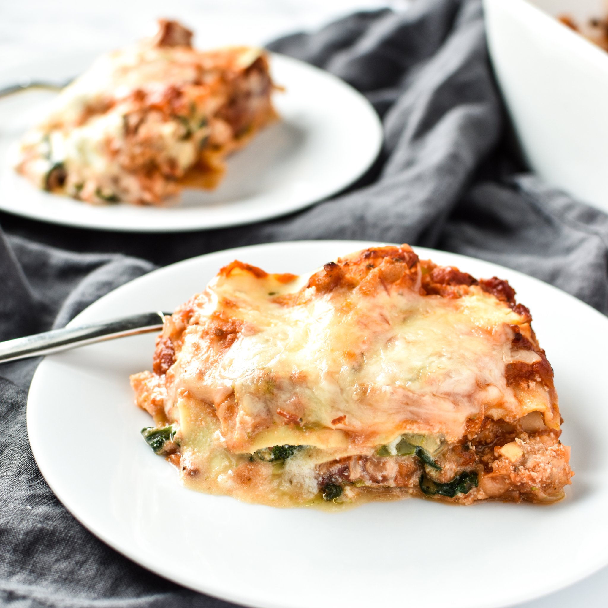 Leftover Vegetable Italian Chicken Lasagna Recipe - Use up leftover veggies in my favorite deliciously layered ground chicken lasagna! - pmp.local