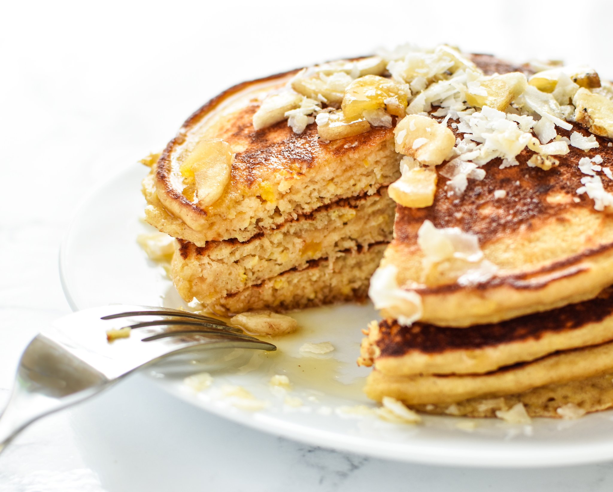 Tropical Pineapple Protein Pancakes Recipe - A perfect blend of pineapple helps keep these delicious protein pancakes moist and perfect for on-the-go! - pmp.local