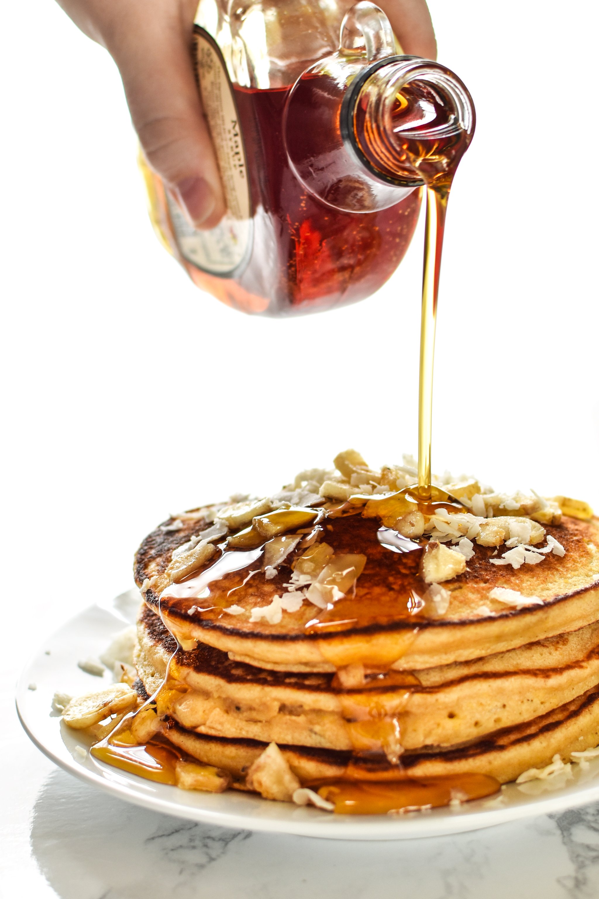 Tropical Pineapple Protein Pancakes Recipe - A perfect blend of pineapple helps keep these delicious protein pancakes moist and great for on-the-go!