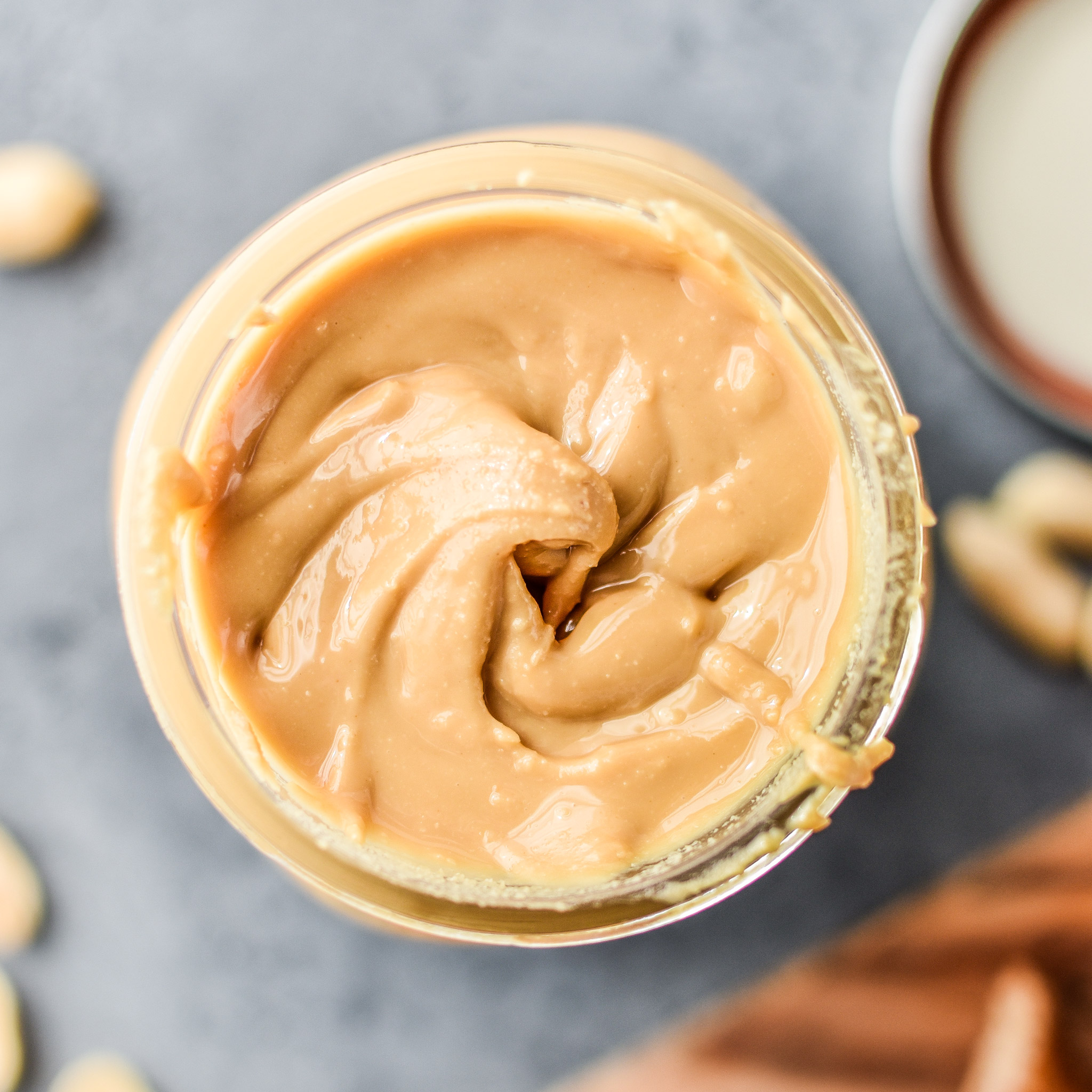 Storing homemade peanut butter in a mason jar for my experiment: Store bought vs Homemade Peanut Butter: Which is Cheaper?