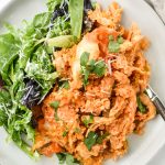 Buffalo Chicken Quinoa Bake served with salad