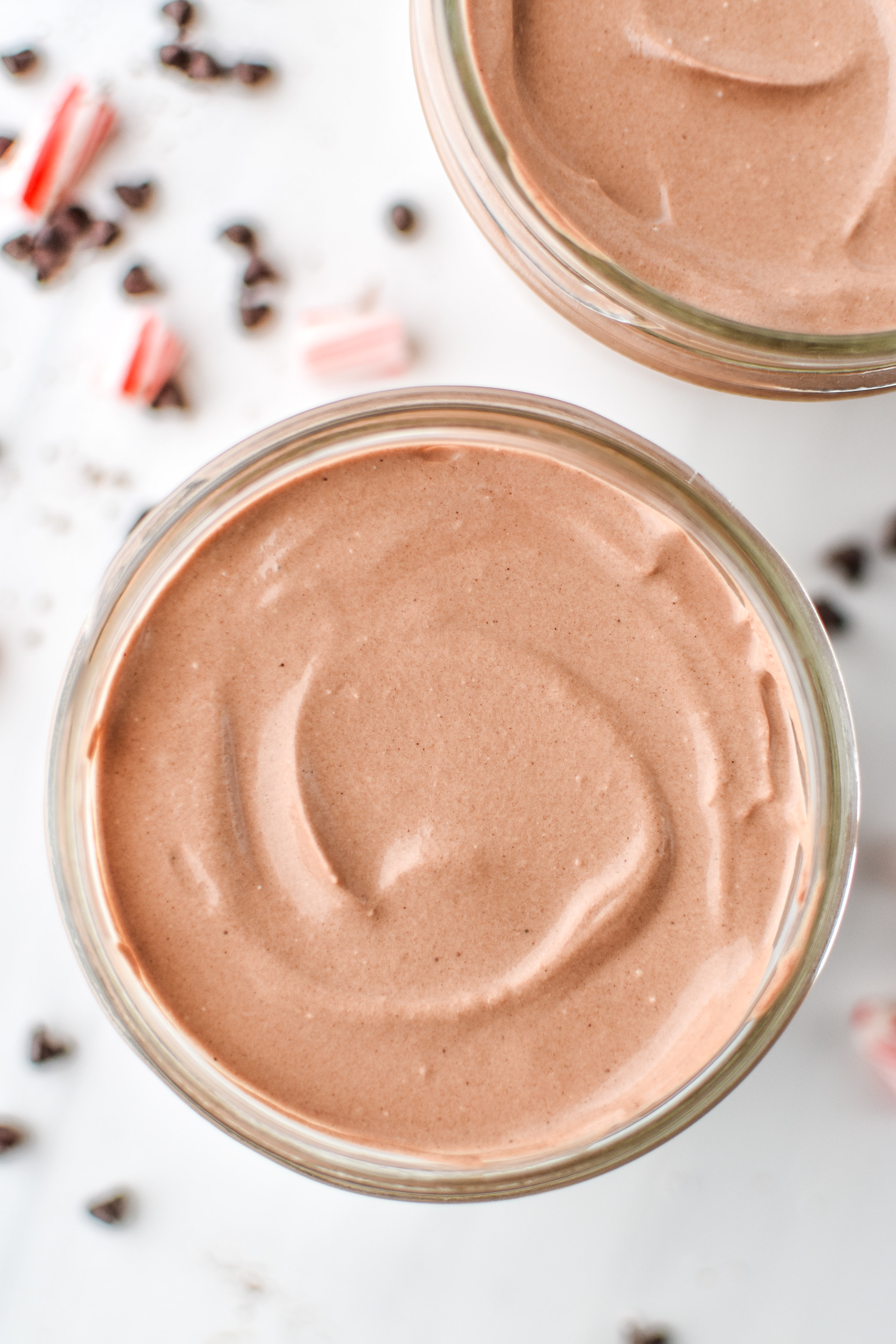 Peppermint chocolate whipped greek yogurt served in mason jars.