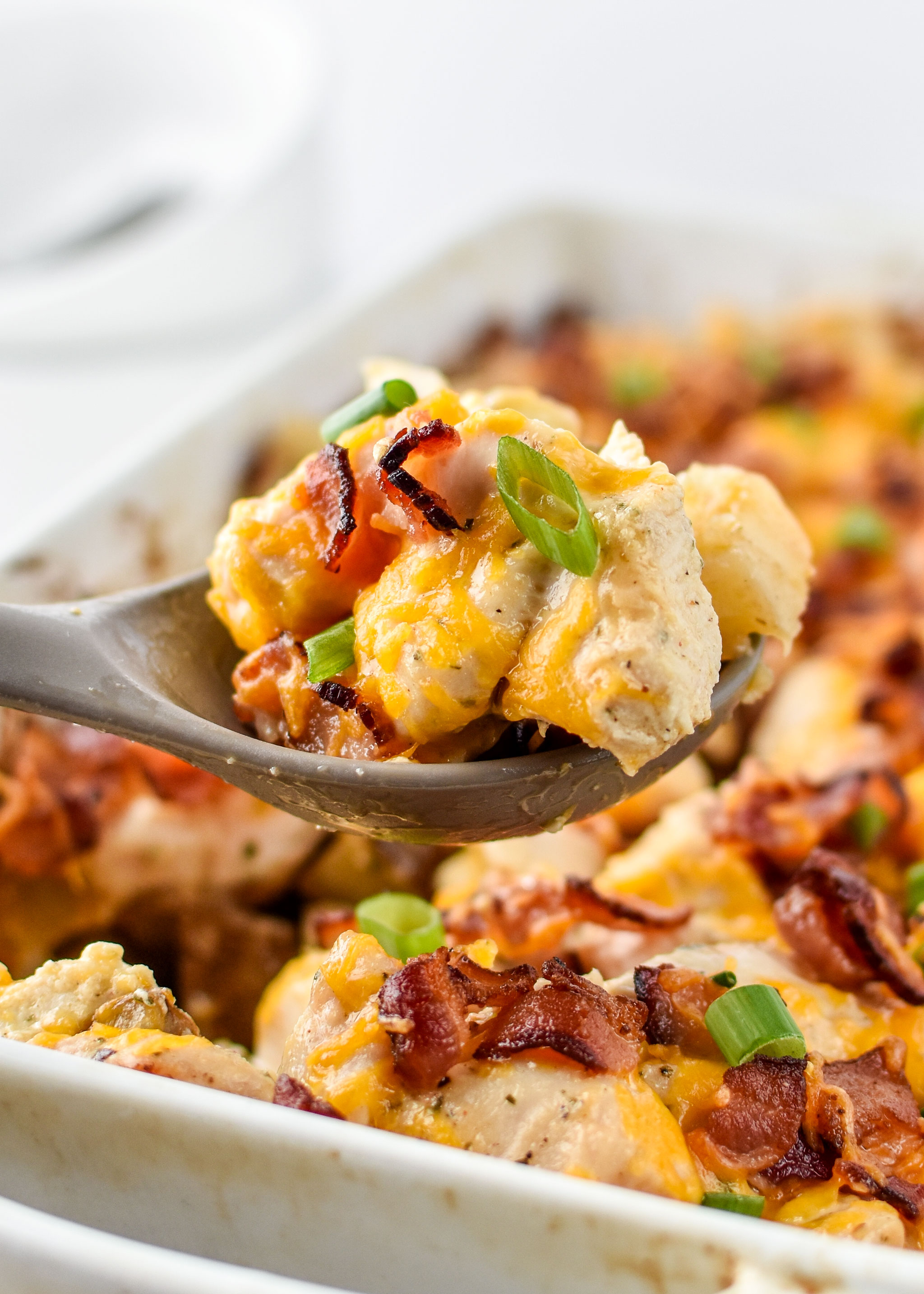 A spoonful of chicken bacon ranch potato bake