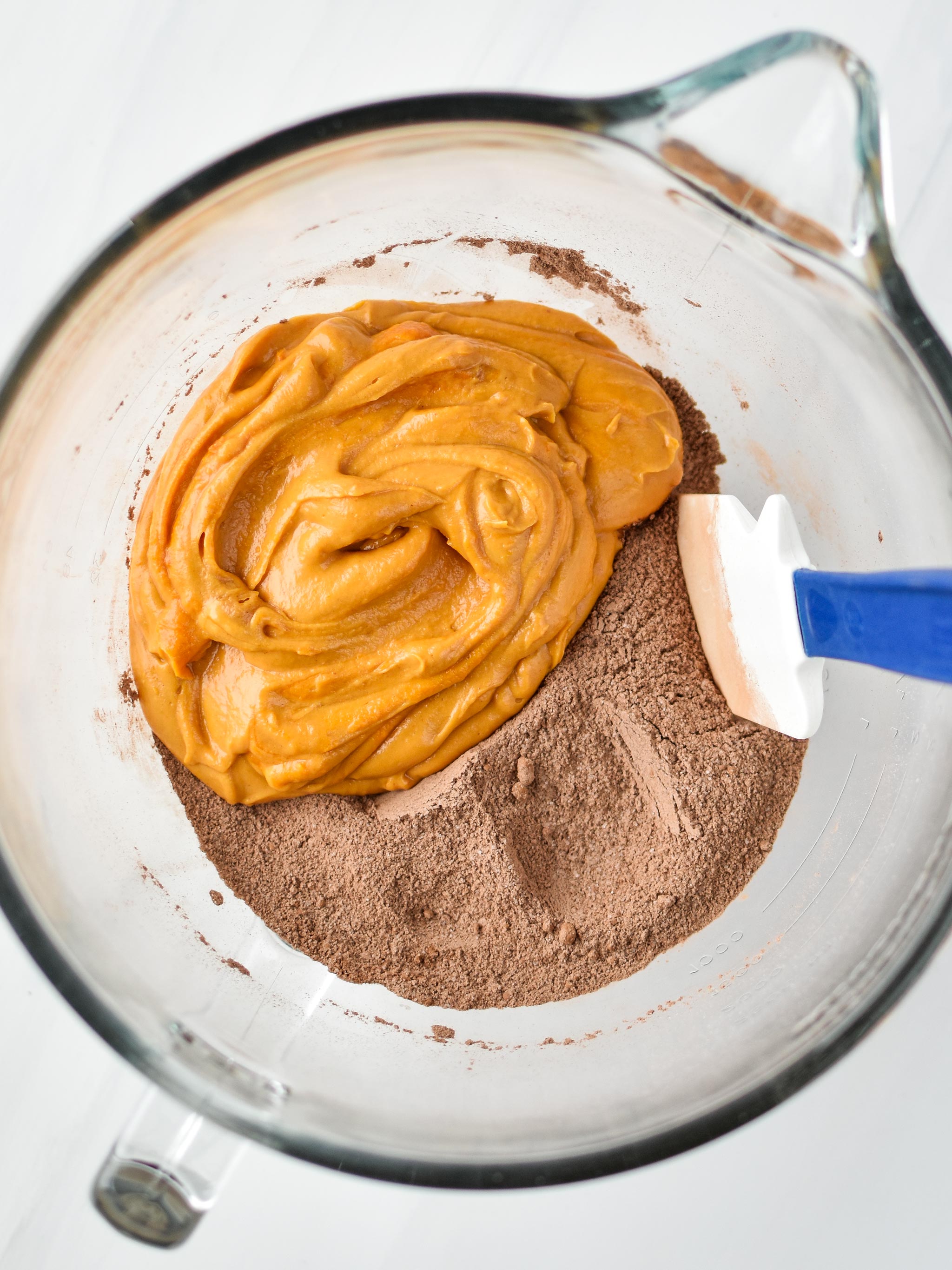 Mixing wet and dry ingredients for my Sweet Potato Brownie Skillet