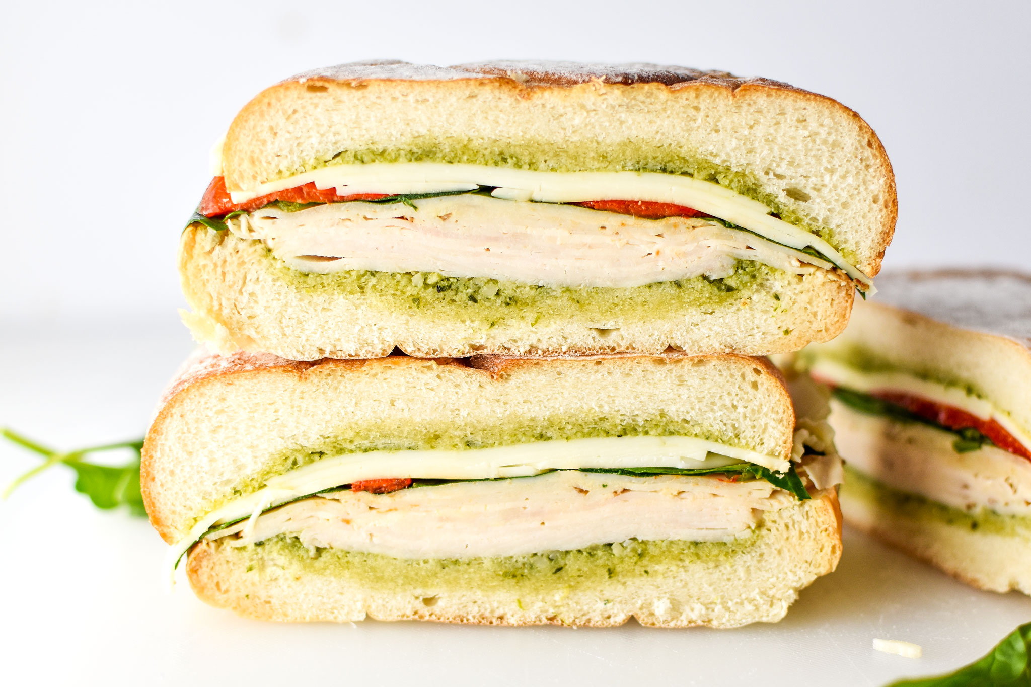inside of the pesto chicken overnight pressed sandwiches