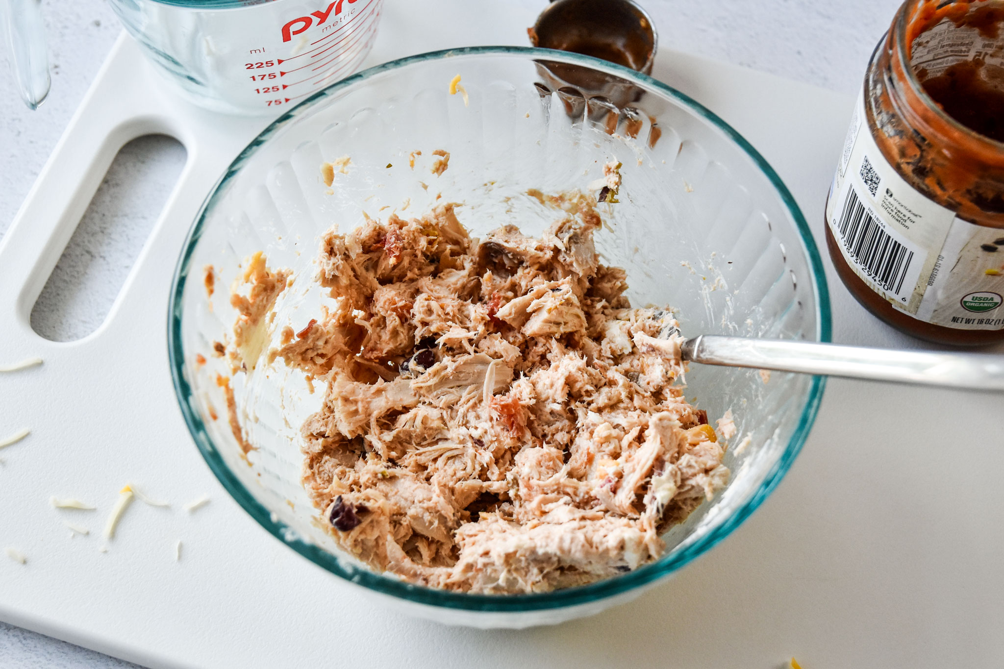 filling mixture with salsa and cheese for the air fryer chicken taquitos