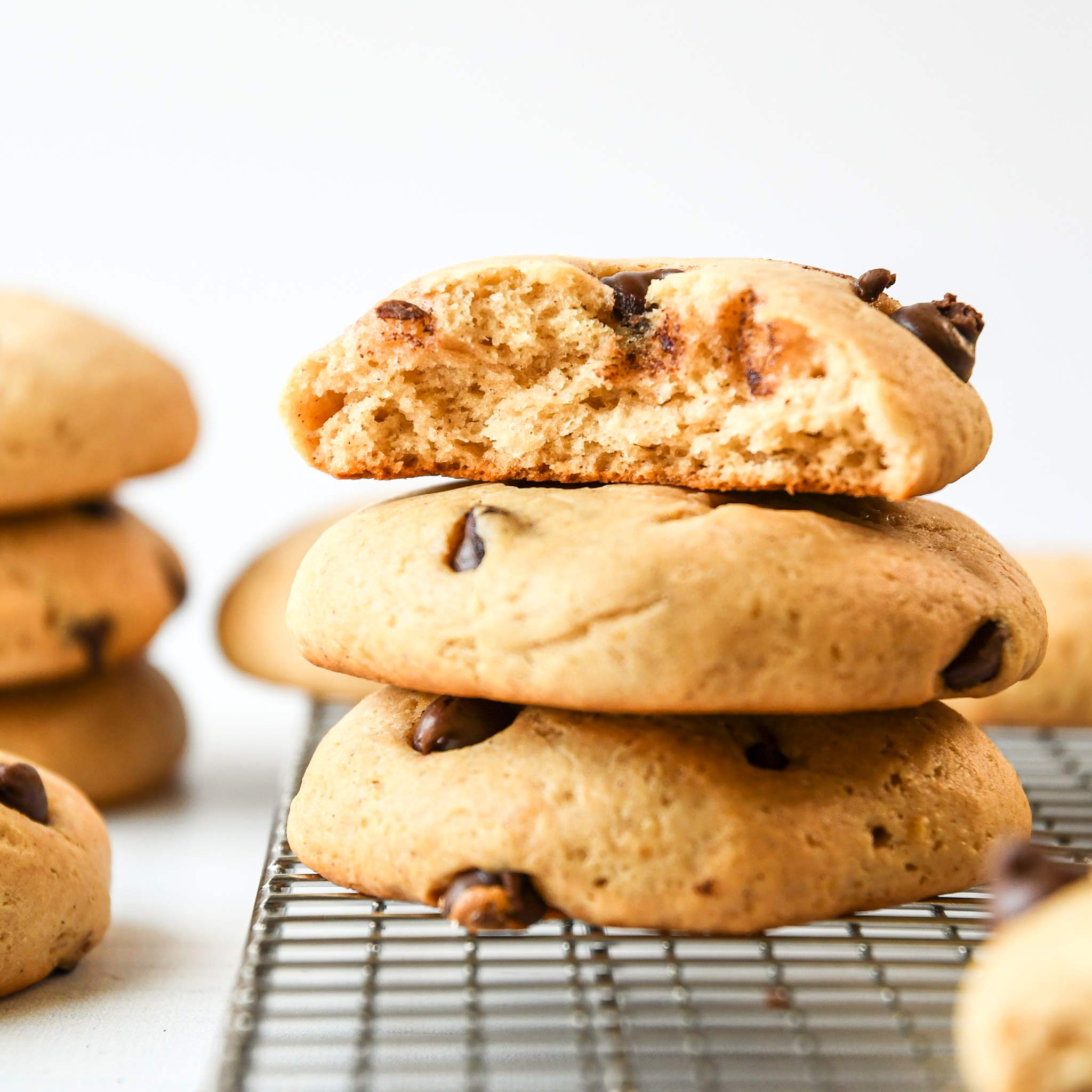 Chocolate chip pancake mix cookies on a cooling rack after being baked