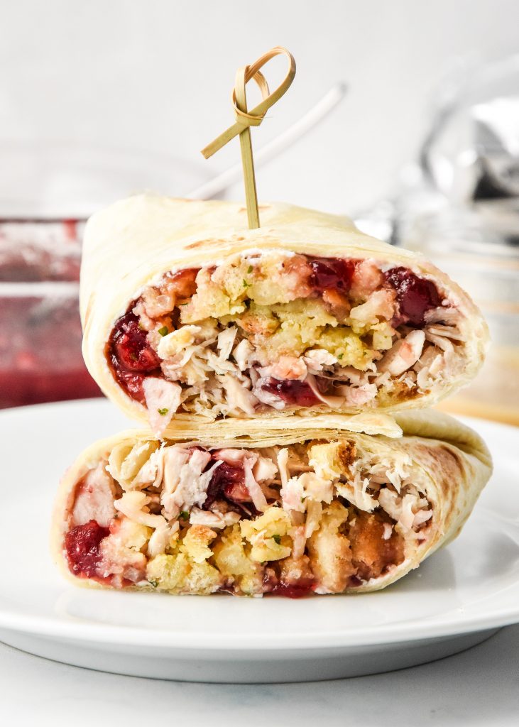 Turkey Gobbler Wrap cut in half on a plate