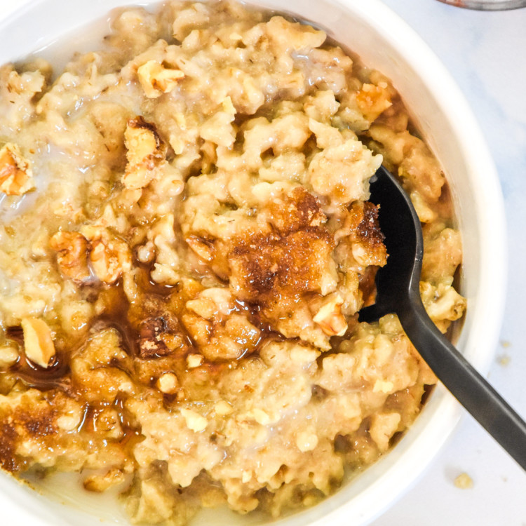 instant pot maple brown sugar oatmeal bowl with brown sugar sprinkled on top