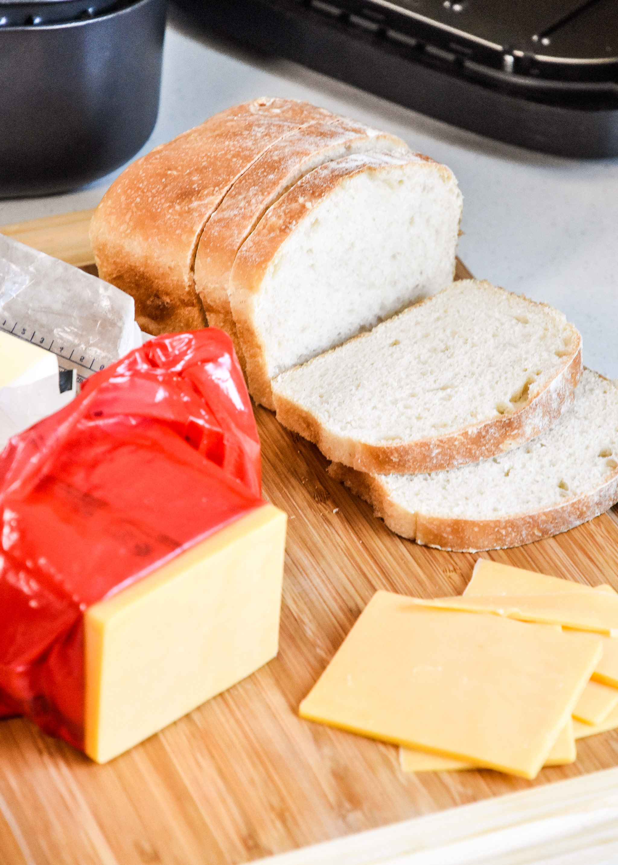 ingredients on a cutting board to make an air fryer grilled cheese sandwich