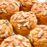 pumpkin spice pancake mix muffins on a cooling rack.