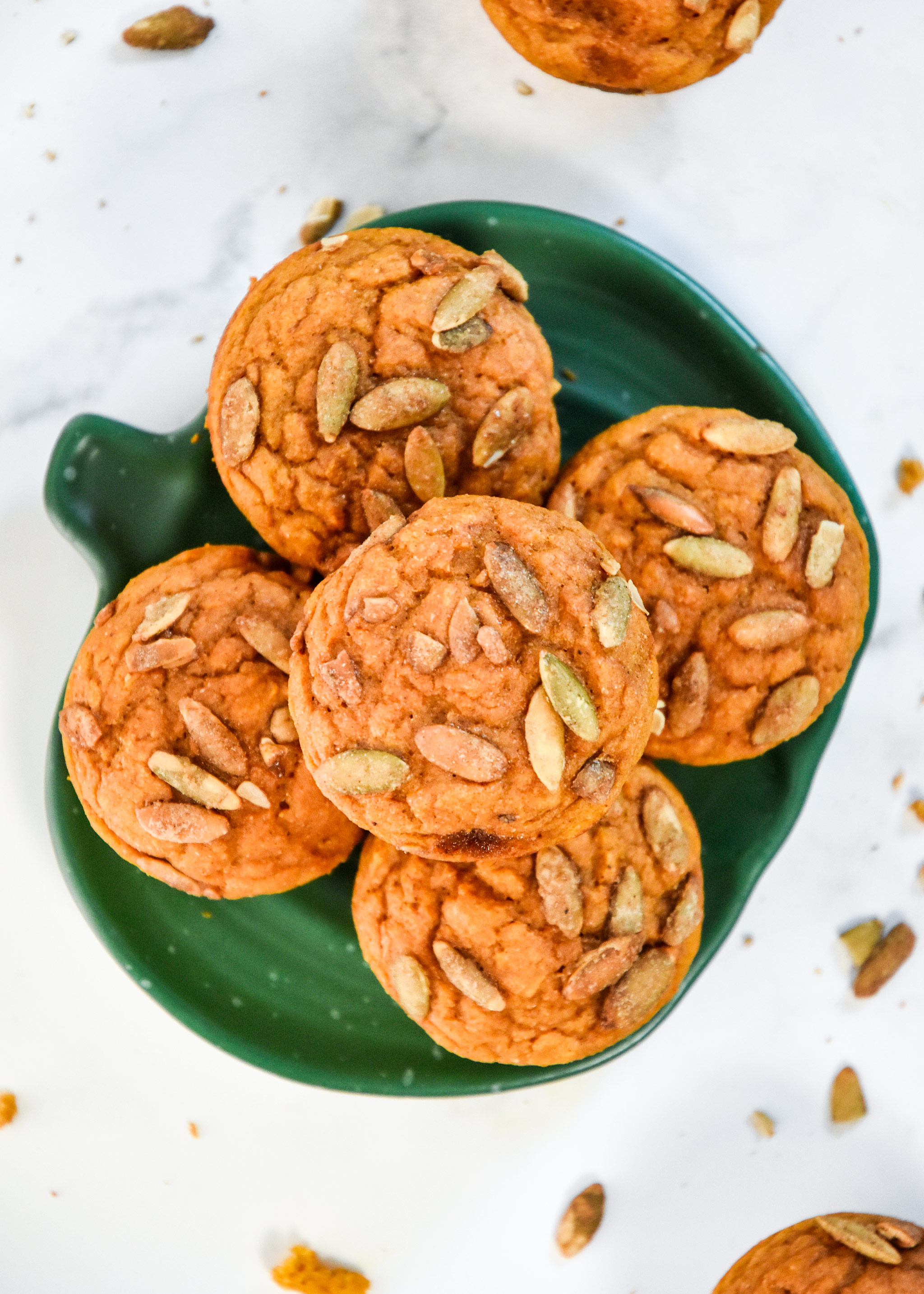 muffins on a green pumpkin shaped plate