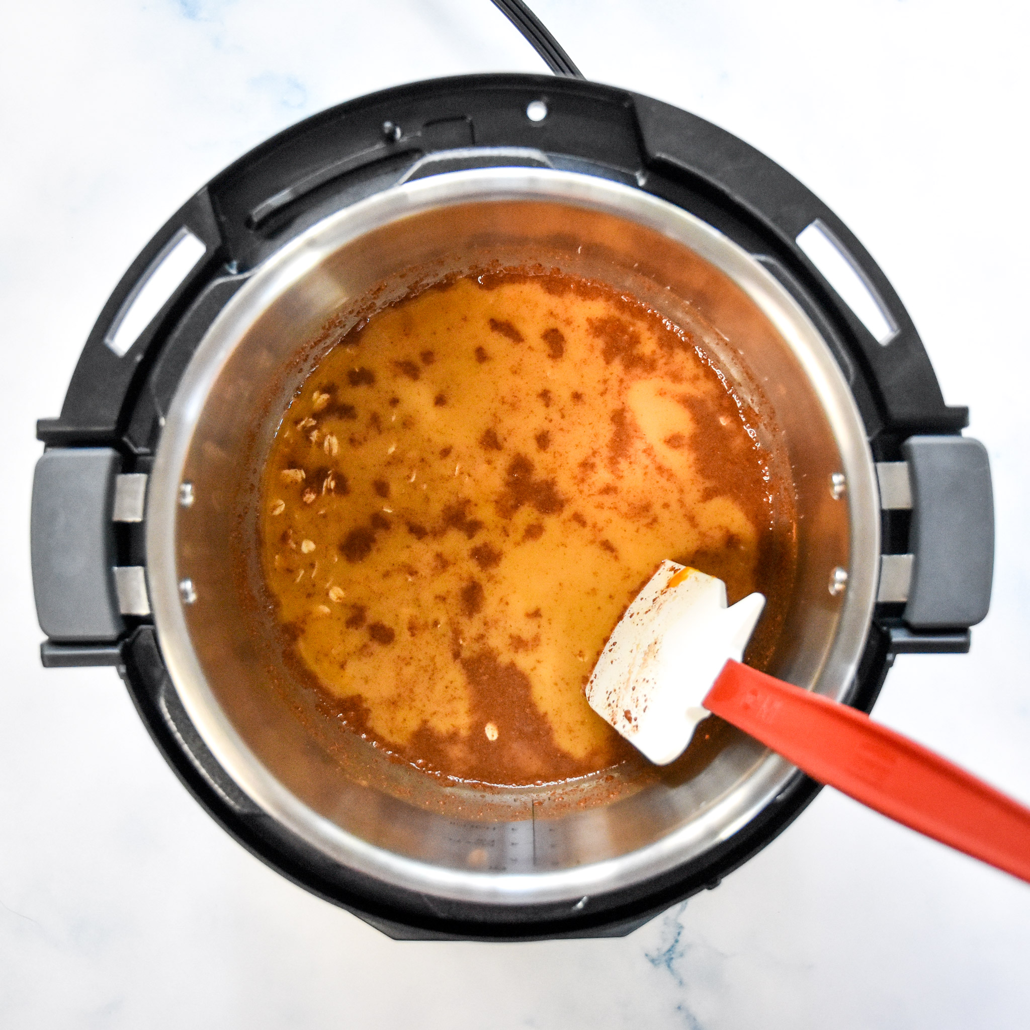 ingredients in the instant pot stirred up.