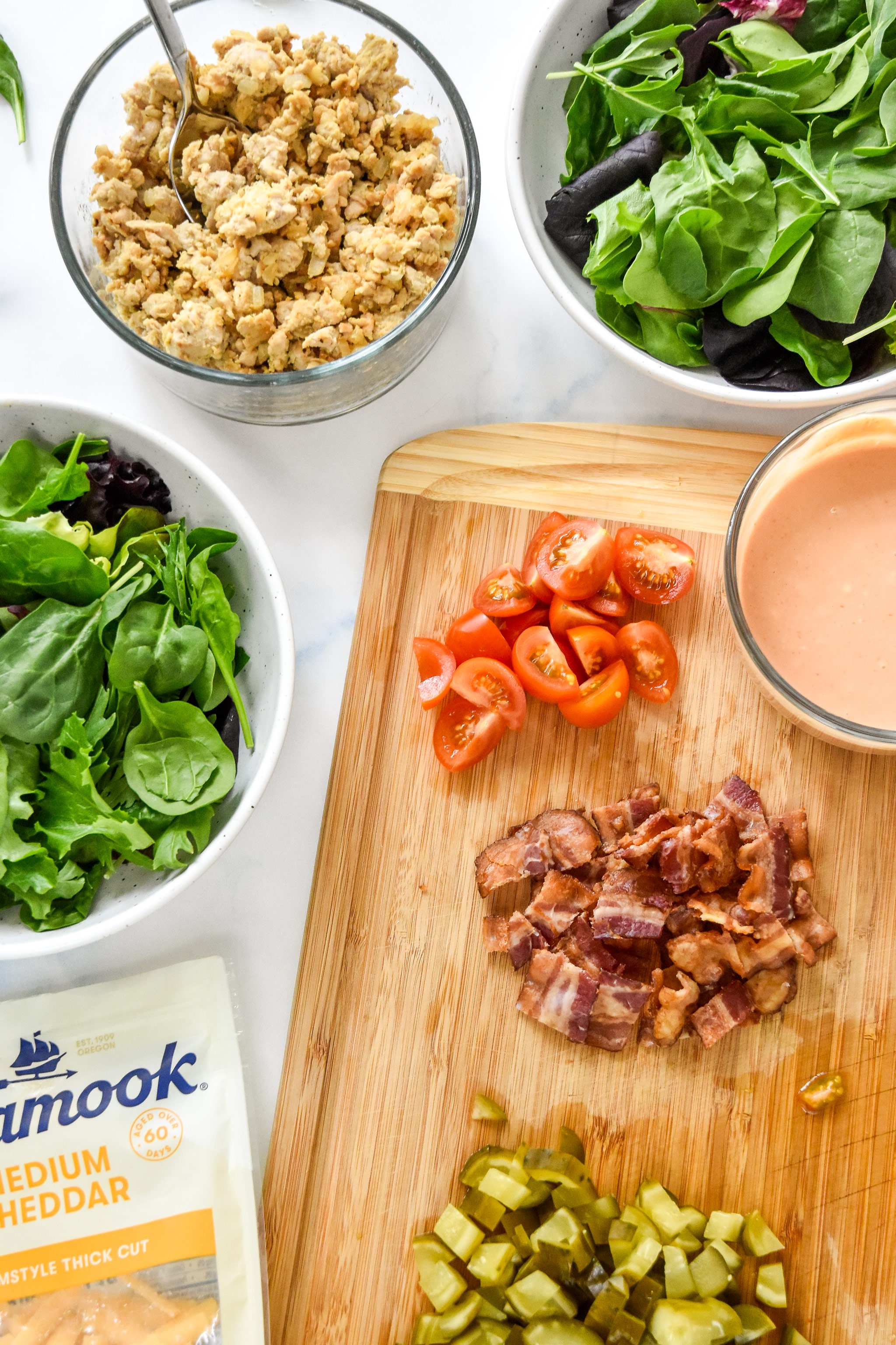 prepped ingredients for the loaded ground turkey burger salads.