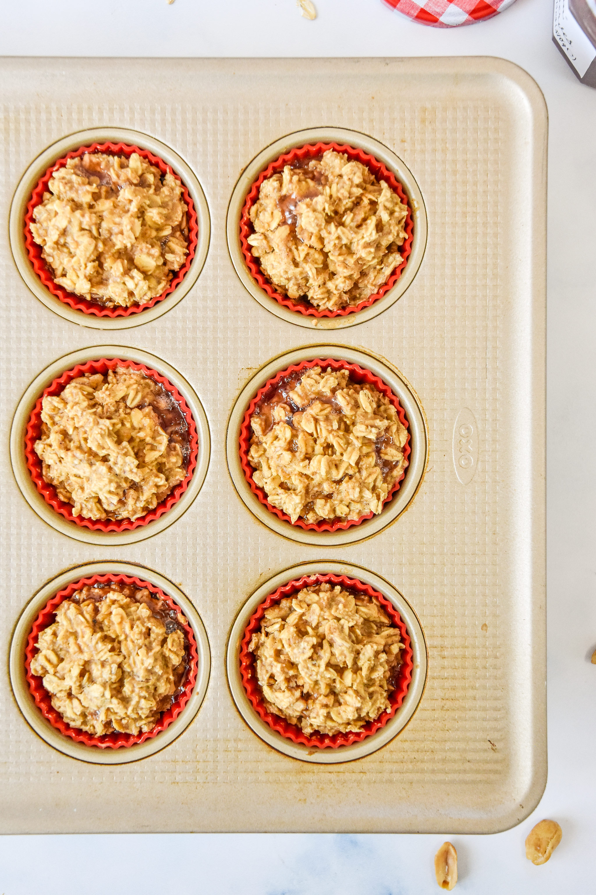 closeup of peanut butter & jelly baked oatmeal cups just baked.