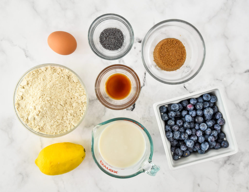 ingredients in the blueberry lemon pancake mix muffins in separate bowls.