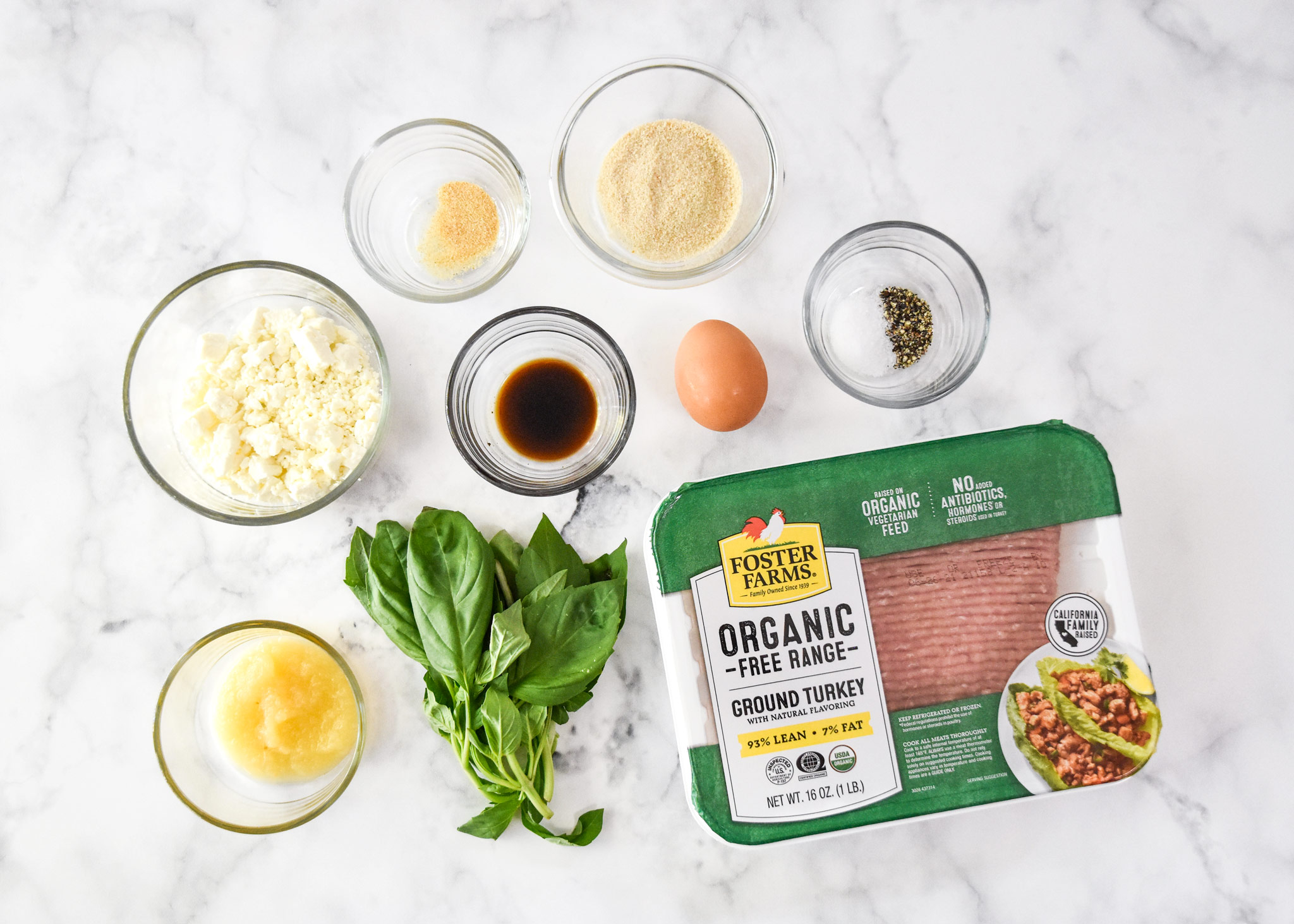 ingredients on a flat surface for the feta basil turkey burgers.