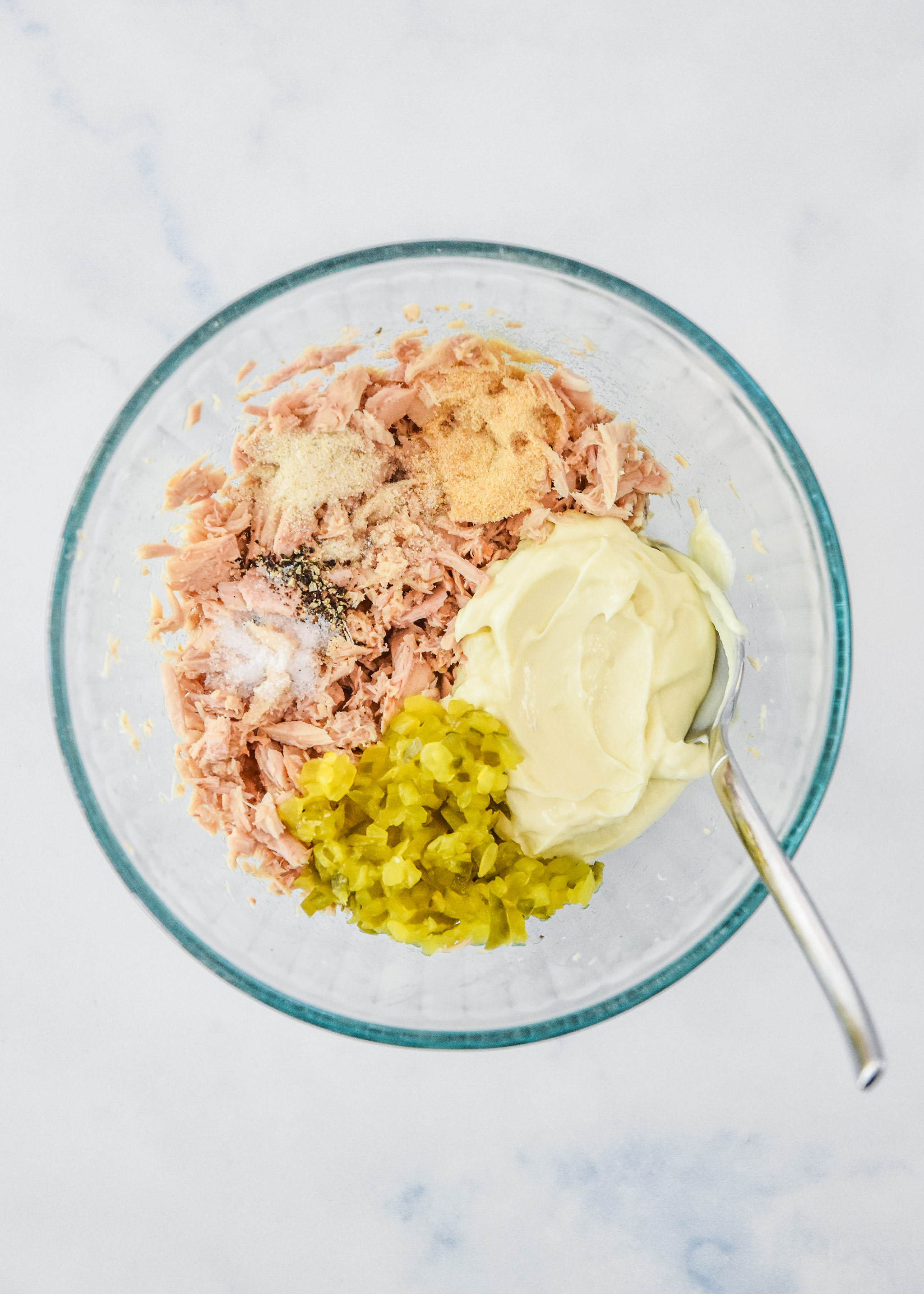 ingredients in the mixing bowl for the tuna salad.
