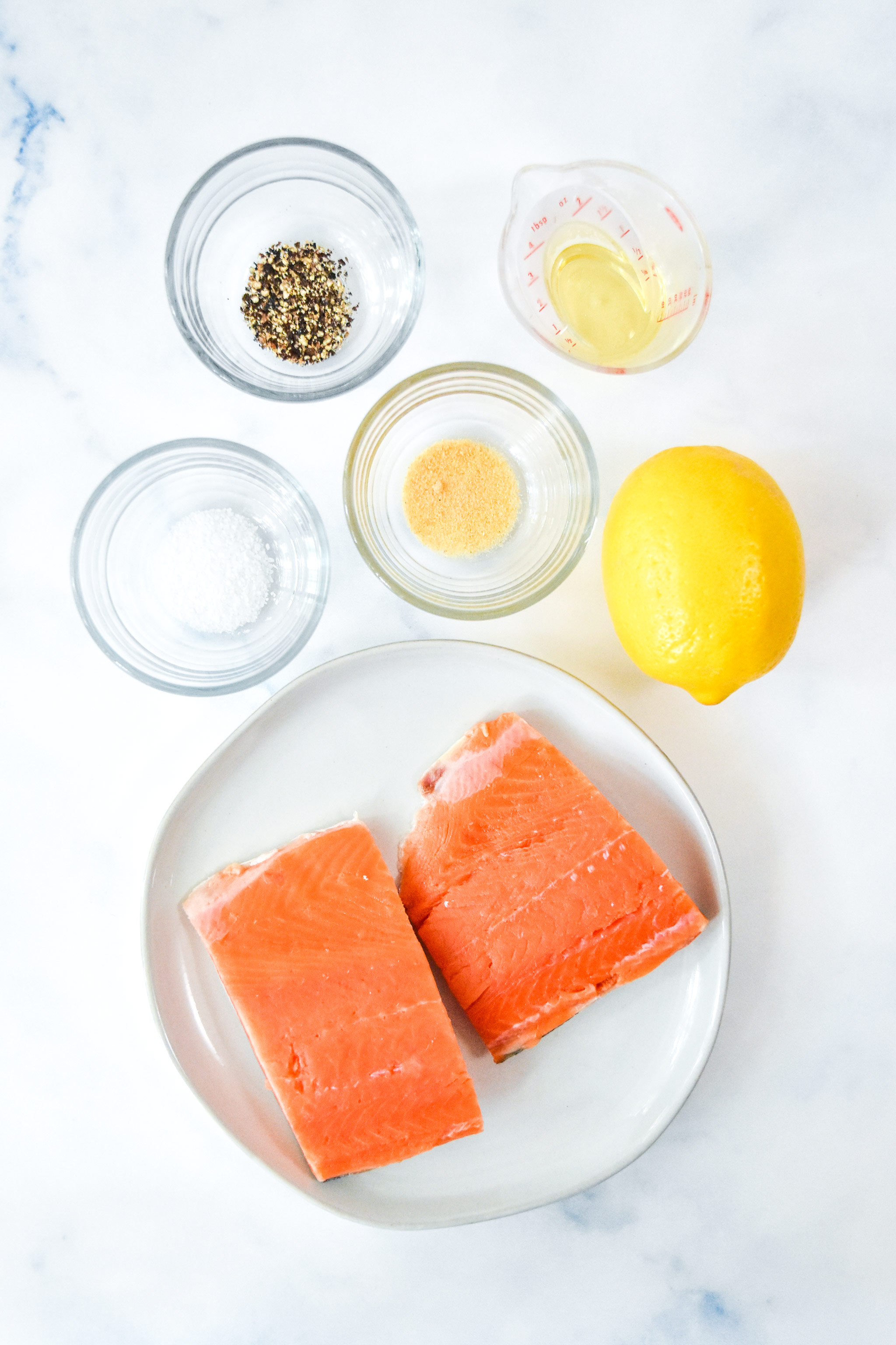 ingredients used in the air fryer lemon pepper salmon recipe.