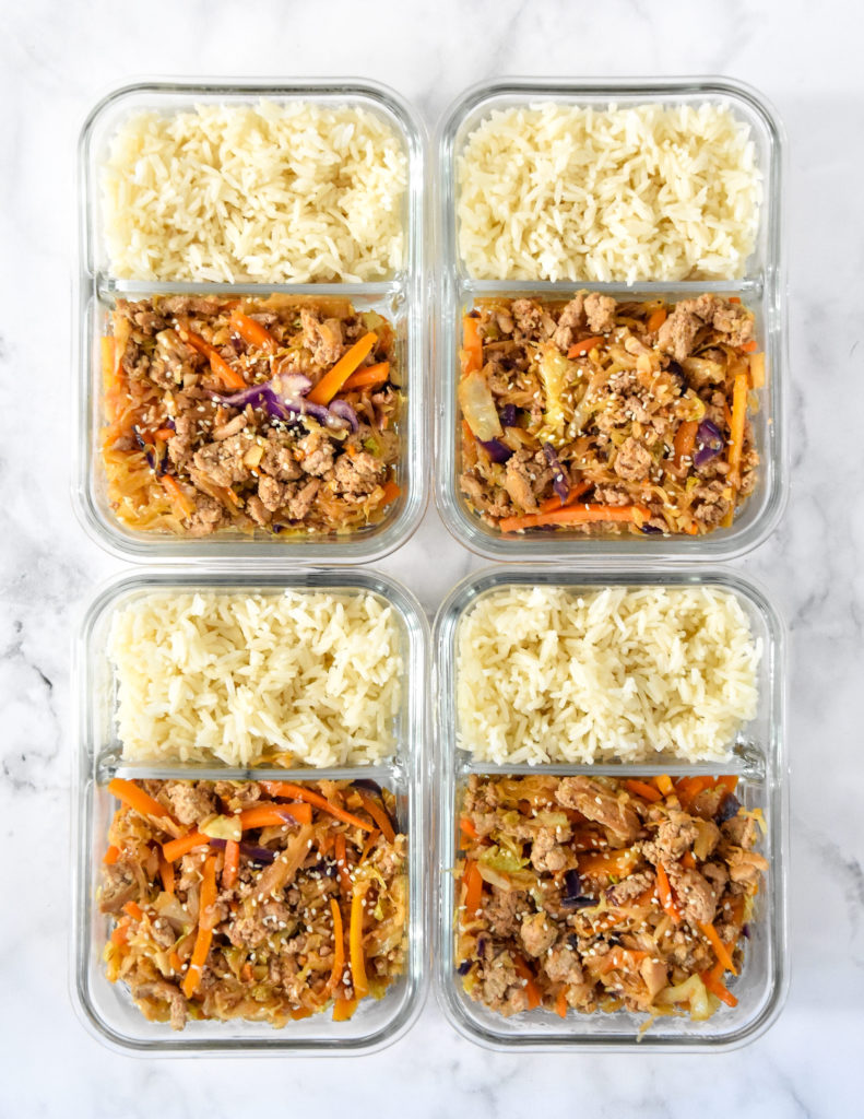 This Spicy Ground Turkey & Cabbage Stir Fry Meal Prep is a flavorful mix of ground turkey, ginger, garlic, chili sauce, fresh cabbage, and carrots. Served over your favorite kind of rice for the one of the easiest meal preps ever!