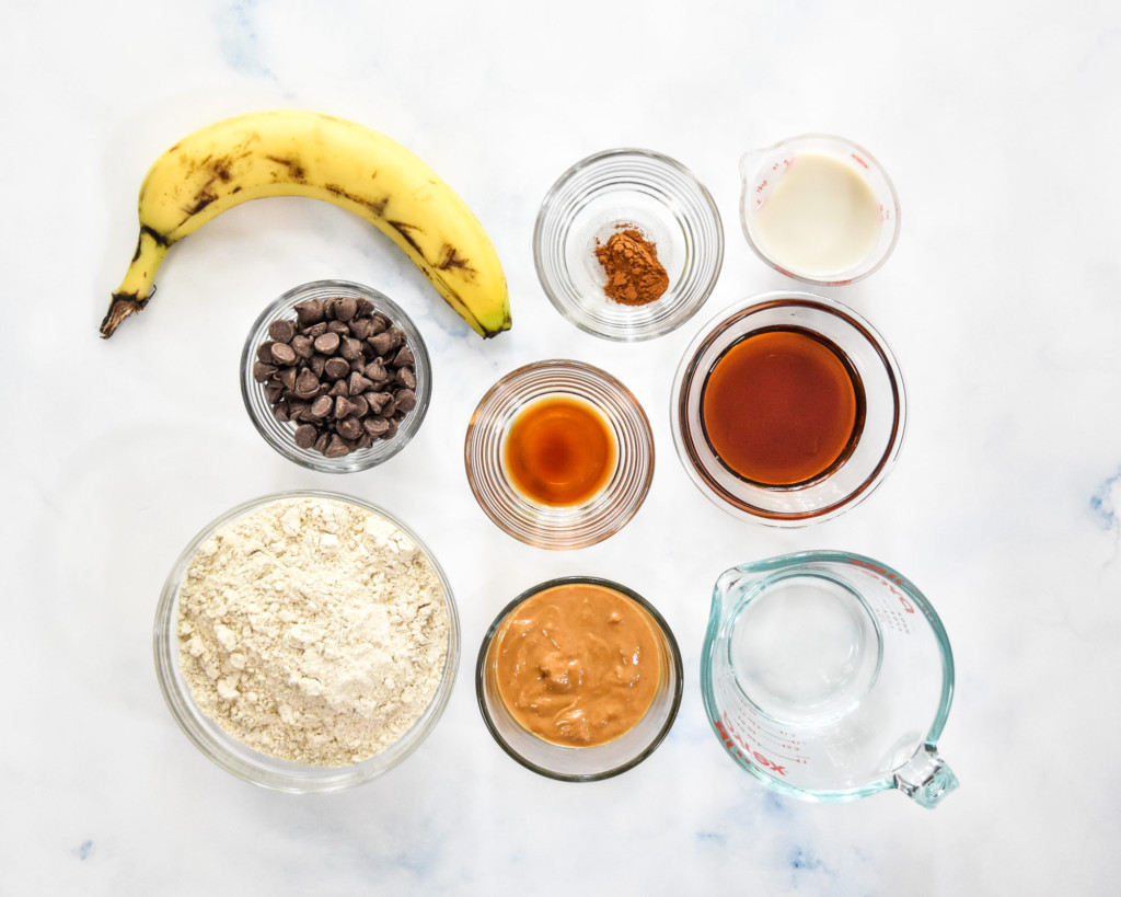 ingredients laid out in bowls for the chocolate chip pancake mix cookies.