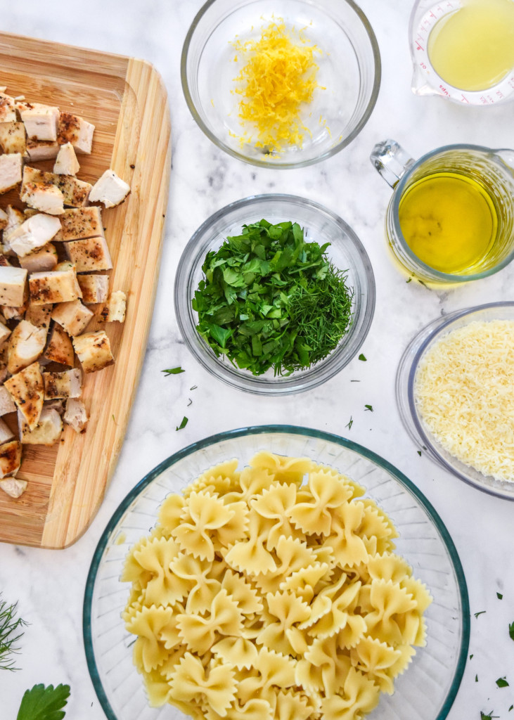 prepared ingredients on a counter before mixing up the herby lemon chicken pasta salad.