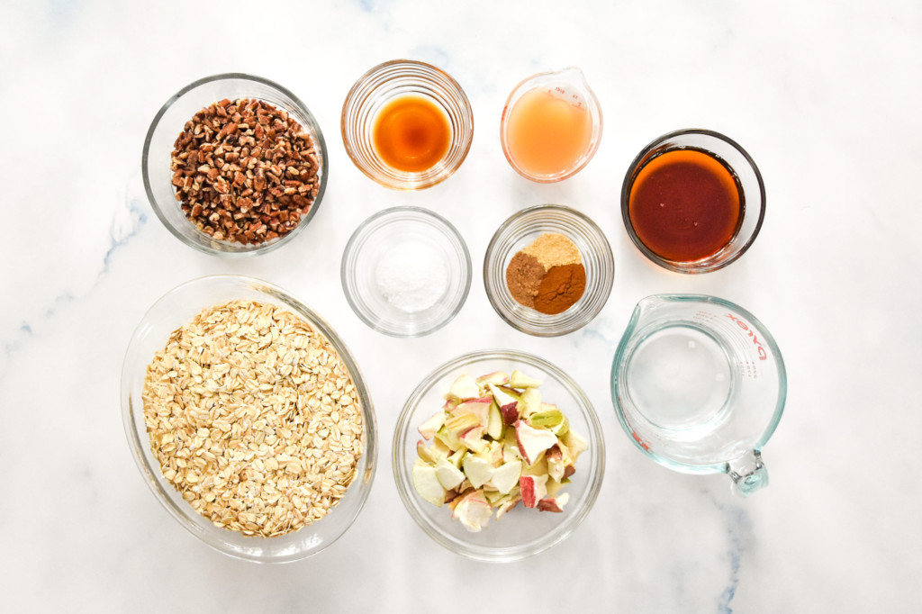 ingredients on a table to make the homemade apple pie spiced granola.