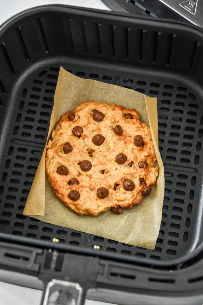 cooked banana oatmeal cookie with chocolate chips in the air fryer.