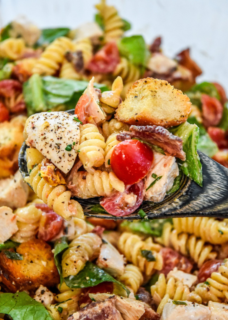 spoonful of make-ahead chicken club pasta salad.