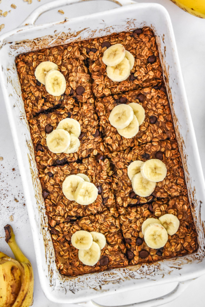 chocolate chip banana bread baked oatmeal fresh baked in a white casserole dish.