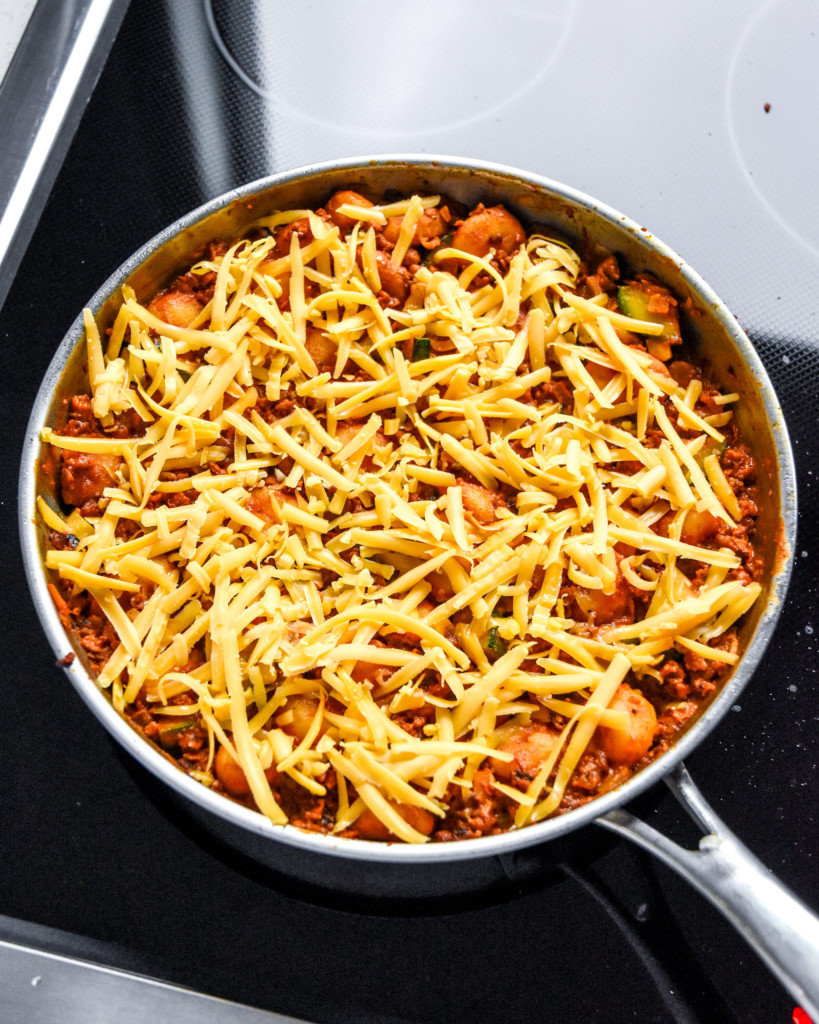 one-pan soy chorizo gnocchi skillet before baking it in the oven to melt the cheese.
