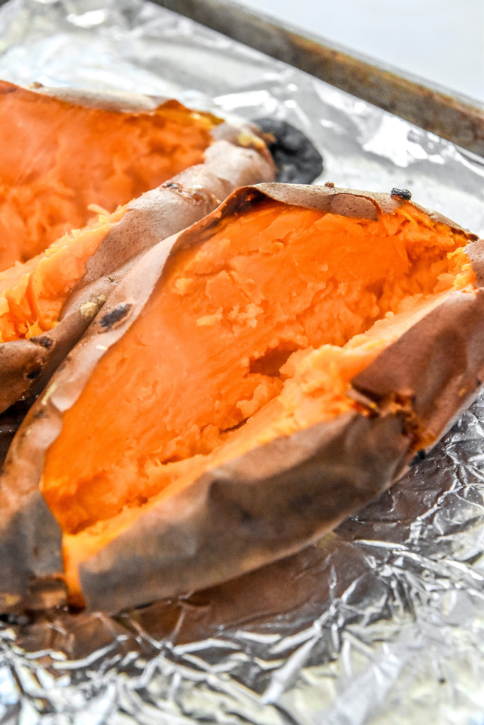 cooked sweet potato cut in half to make mashed sweet potato.