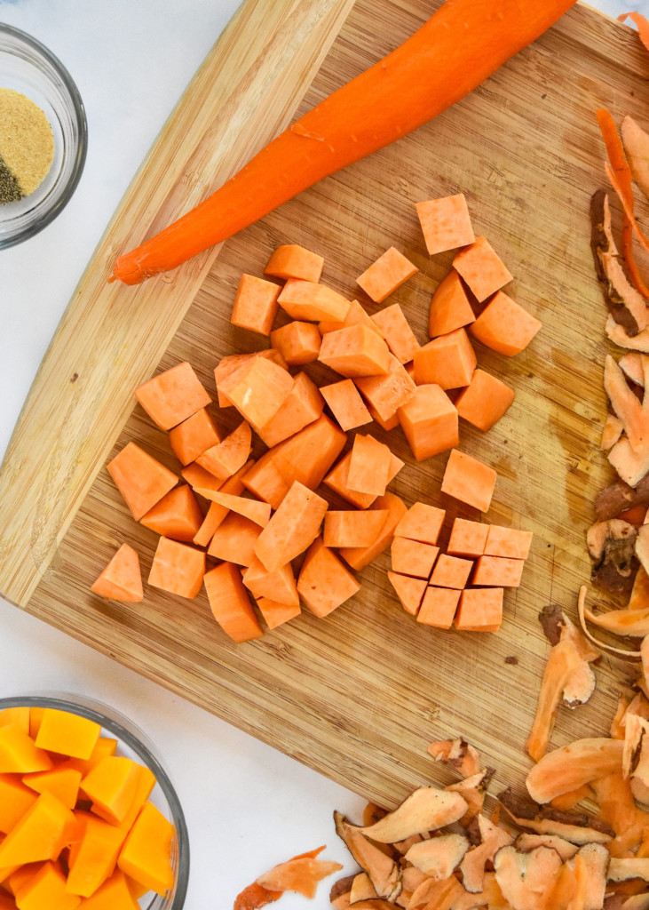 diced sweet potatoes on a cutting board.