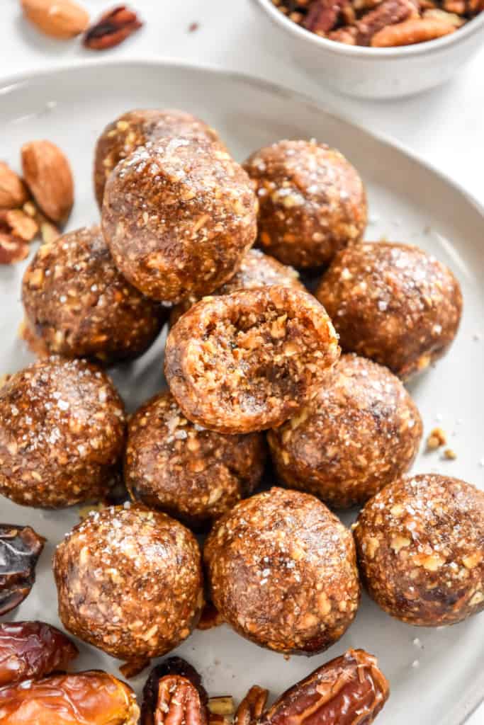 no-bake pecan pie date balls on a plate.