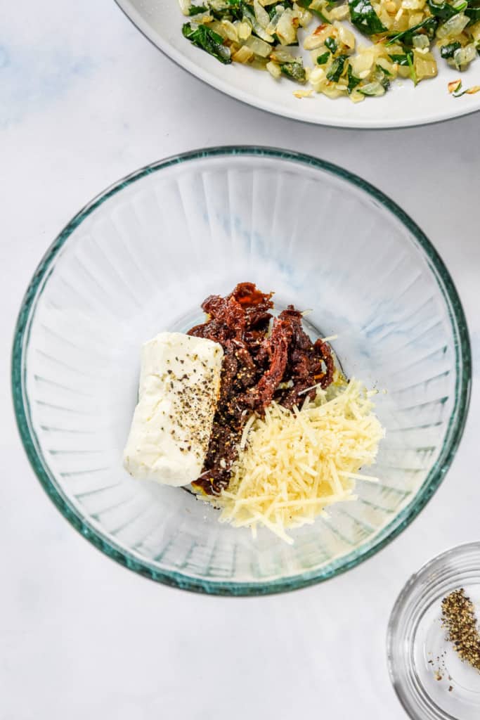 cream cheese, sun dried tomatoes and parmesan cheese for the chicken breast filling.