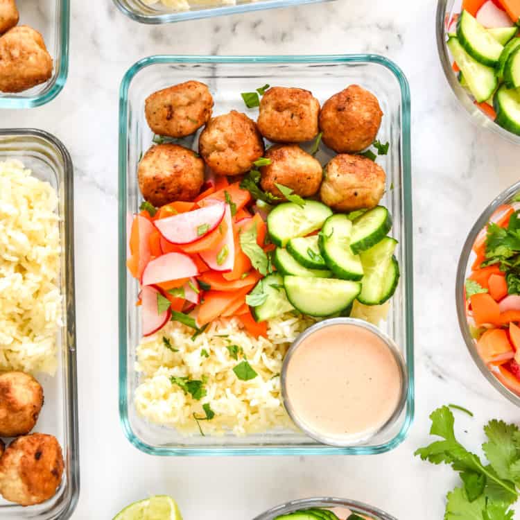 Banh Mi Inspired Meal Prep Bowls in glass rectangular meal prep containers.