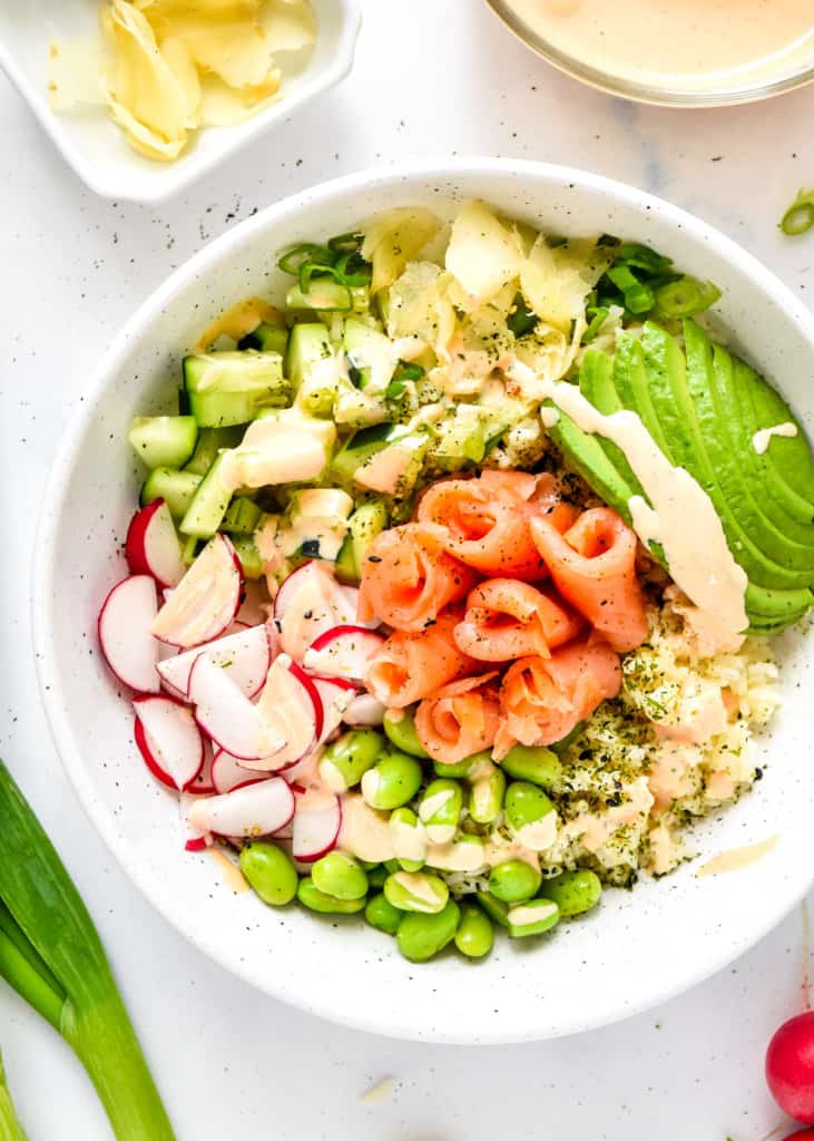 Easy smoked salmon rice bowls with creamy spicy mayo on top.