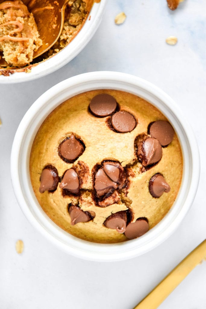 cooked individual air fryer baked oats with chocolate chips on top.