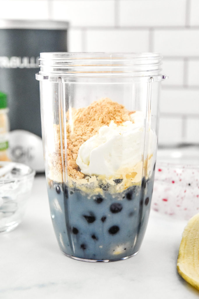 smoothie ingredients in the nutribullet cup before blending.