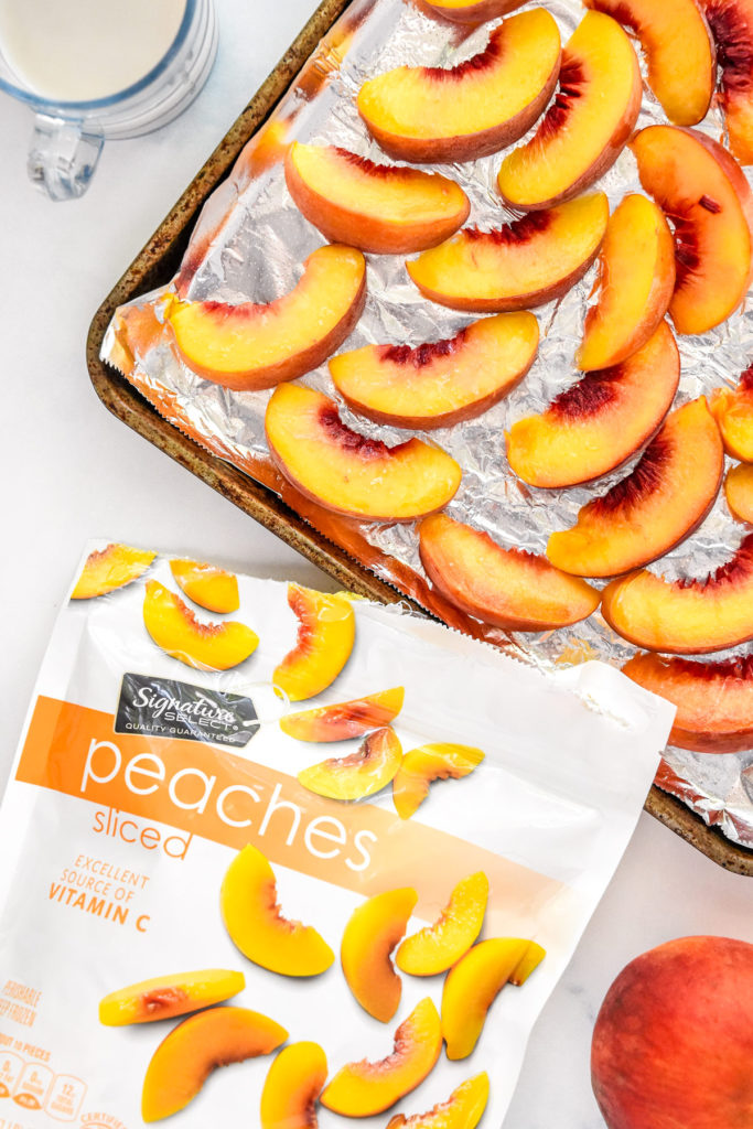 frozen peaches from the store and hand cut on a tray.