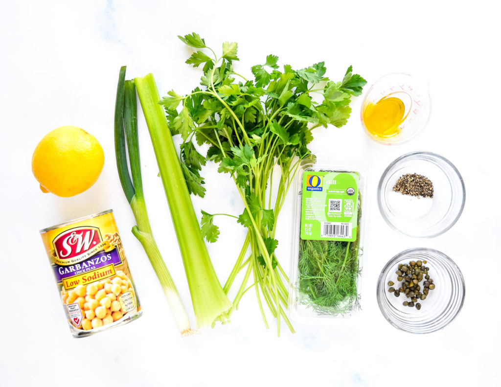ingredients laid out before chopping to make the herby lemon mashed chickpea salad.